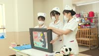 学生が園児に歯科講習